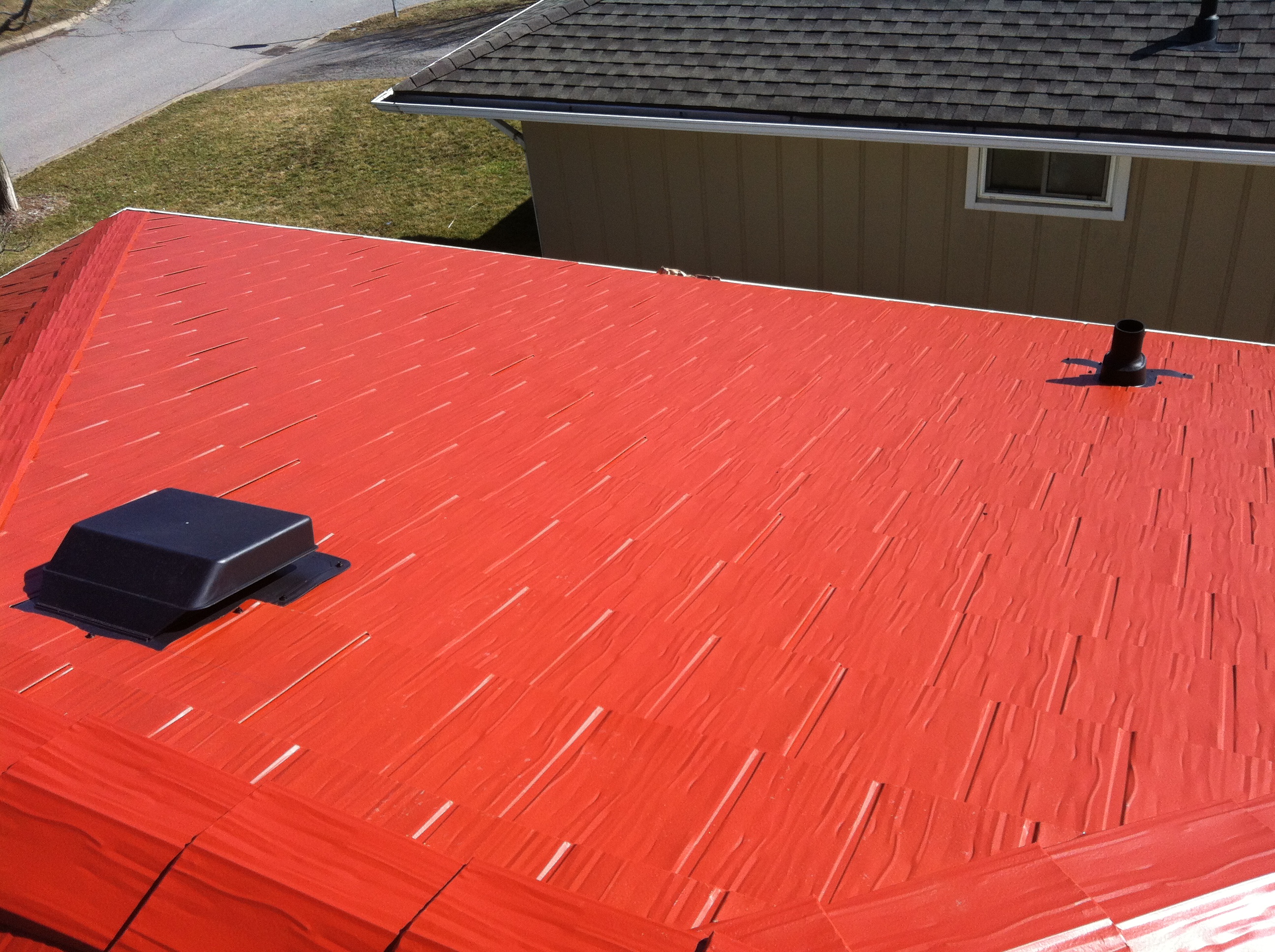 red coloured metal roof